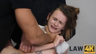 Два надзирателя на столе насилуют худую тинку в наручниках в ротик и пизду